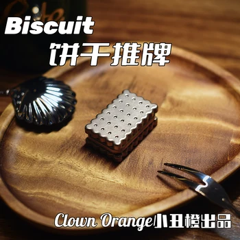 Bisküvi bisküvi itme kartı palyaço turuncu metal kraker sikke dekompresyon artefakt oyuncak parmak cayro EDC